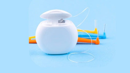 Set of interdental brushes and dental floss for effective cleaning between teeth to maintain oral health